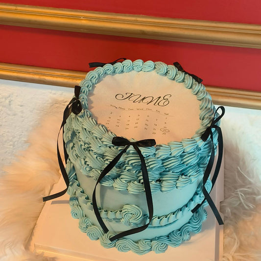 Blue And Black Burn Away Coquette Ribbon Cake